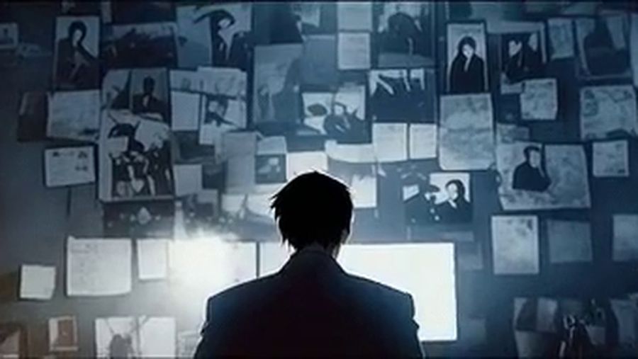 The board of faces, and the man reading it